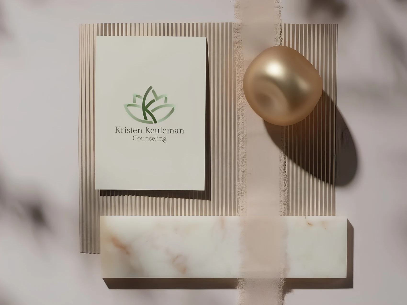 Kristen Keuleman Counseling identity presented on cream stationery with olive green lettering